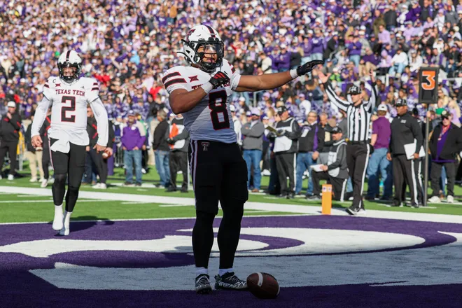 Nov 1, 2025; Manhattan, Kansas, USA; Texas Tech Red Raiders running back Cameron Dickey (8) celebrates after scoring a touchdown in the second quarter against the Kansas State Wildcats at Bill Snyder Family Football Stadium. Mandatory Credit: Scott Sewell-Imagn Images