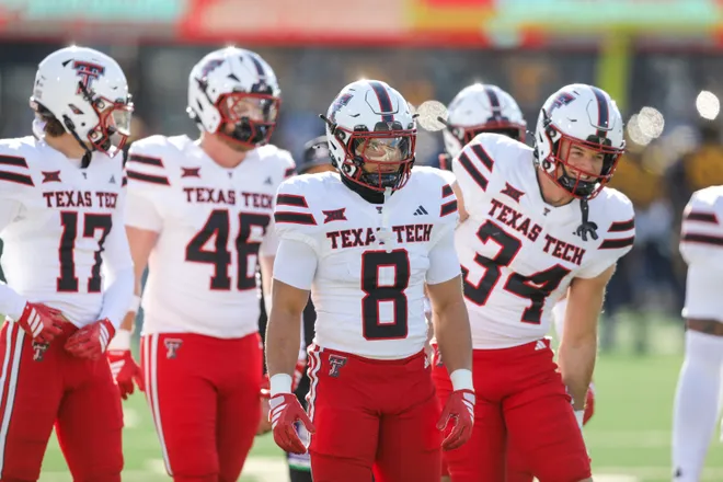 Nov 29, 2025; Morgantown, West Virginia, USA; Texas Tech Red Raiders running back Cameron Dickey (8) warms up prior to their game against the West Virginia Mountaineers at Milan Puskar Stadium. Mandatory Credit: Ben Queen-Imagn Images