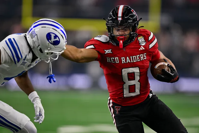 Dec 6, 2025; Arlington, TX, USA; Texas Tech Red Raiders running back Cameron Dickey (8) runs with the ball during the game between the Red Raiders and the Cougars at AT & T Stadium. Mandatory Credit: Jerome Miron-Imagn Images