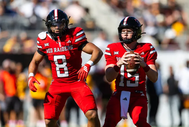 Oct 18, 2025; Tempe, Arizona, USA; Texas Tech Red Raiders running back Cameron Dickey (8) blocks for quarterback Will Hammond (15) against the Arizona State Sun Devils at Mountain America Stadium. Mandatory Credit: Mark J. Rebilas-Imagn Images