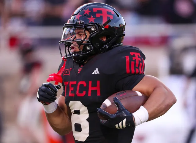 Texas Tech's Cameron Dickey runs for a touchdown against Kansas during a Big 12 Conference football game, Saturday, Oct. 11, 2025, at Jones AT & T Stadium in Lubbock.