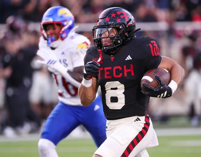 Texas Tech's Cameron Dickey runs for a touchdown against Kansas during a Big 12 Conference football game, Saturday, Oct. 11, 2024 at Jones AT & T Stadium in Lubbock.