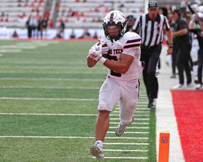 Sep 20, 2025; Salt Lake City, Utah, USA; Texas Tech Red Raiders running back Cameron Dickey (8) runs for a touchdown against the Utah Utes during the fourth quarter at Rice-Eccles Stadium. Mandatory Credit: Rob Gray-Imagn Images