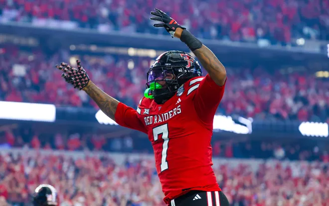 Dec 6, 2025; Arlington, TX, USA; Texas Tech Red Raiders tight end Terrance Carter Jr. (7) reacts after scoring a two point conversion during the second half against the BYU Cougars at AT & T Stadium. Mandatory Credit: Kevin Jairaj-Imagn Images