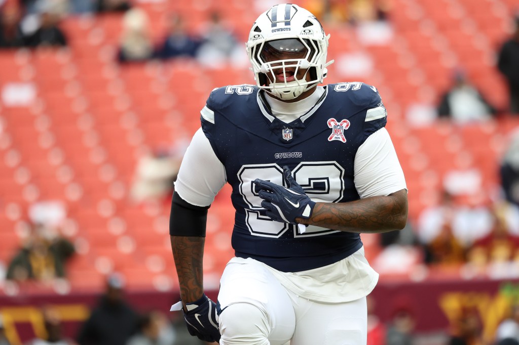Dallas Cowboys defensive tackle Quinnen Williams (92) on the field.