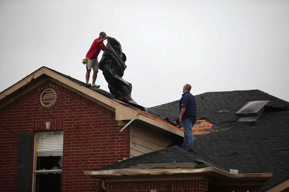 Texas sues roofer as victims' losses near half a million