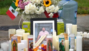 A memorial grows at the site where Lorenzo Salgado Araujo was fatally shot by ICE agents, last week, on Monday, July 13, 2026, in Houston. (AP Photo/Karen Warren)