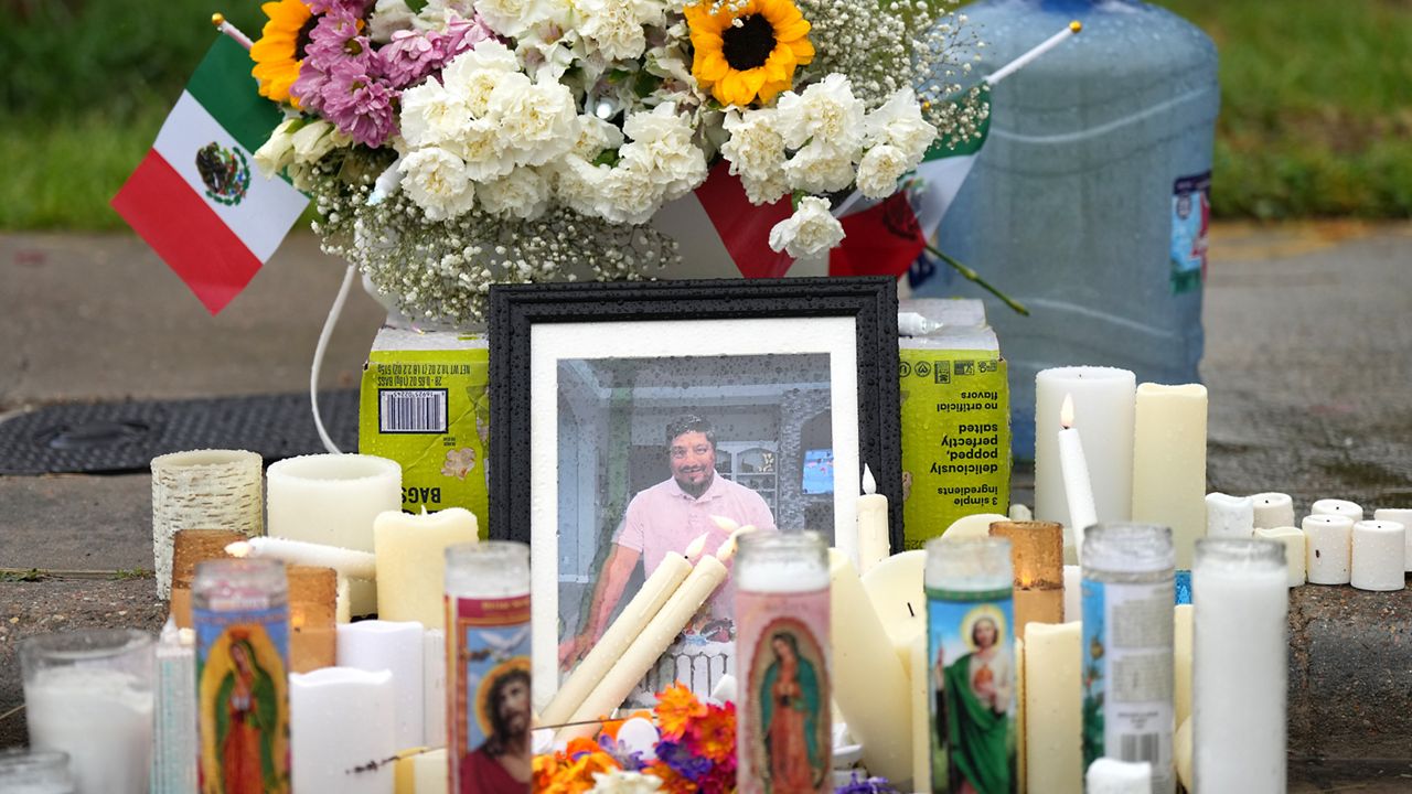 A memorial grows at the site where Lorenzo Salgado Araujo was fatally shot by ICE agents, last week, on Monday, July 13, 2026, in Houston. (AP Photo/Karen Warren)