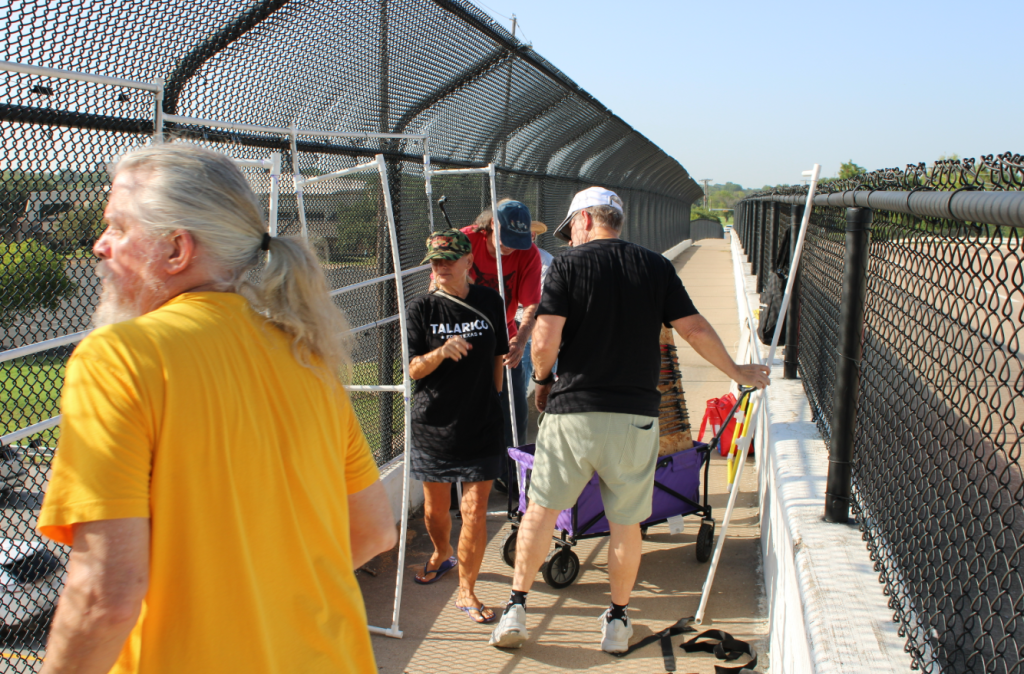 Kocher and other activists begin loading supplies onto wagons shortly after 9 a.m.