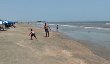 Galveston beachgoers braved the heat, potential storm