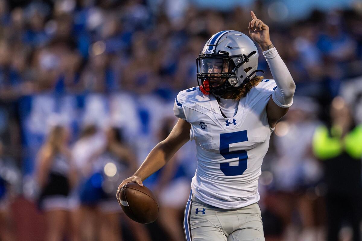 Burleson Centennial quarterback Jacob Torres points to a receiver in the first quarter of the 2024 Boot Bowl game against Burleson High School at BISD Stadium.