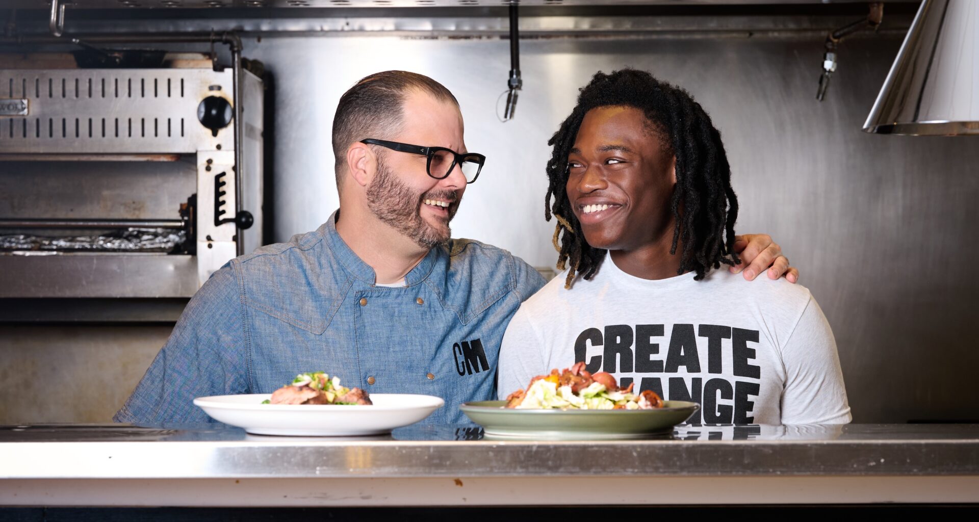 Chad House and an intern at Cafe Momentum