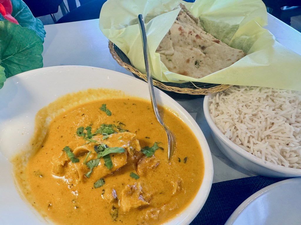 chicken korma, rice and naan at Elephant Indian Grill