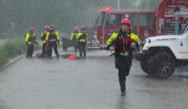 Texas flooding surges as rescuers pull people from rising waters