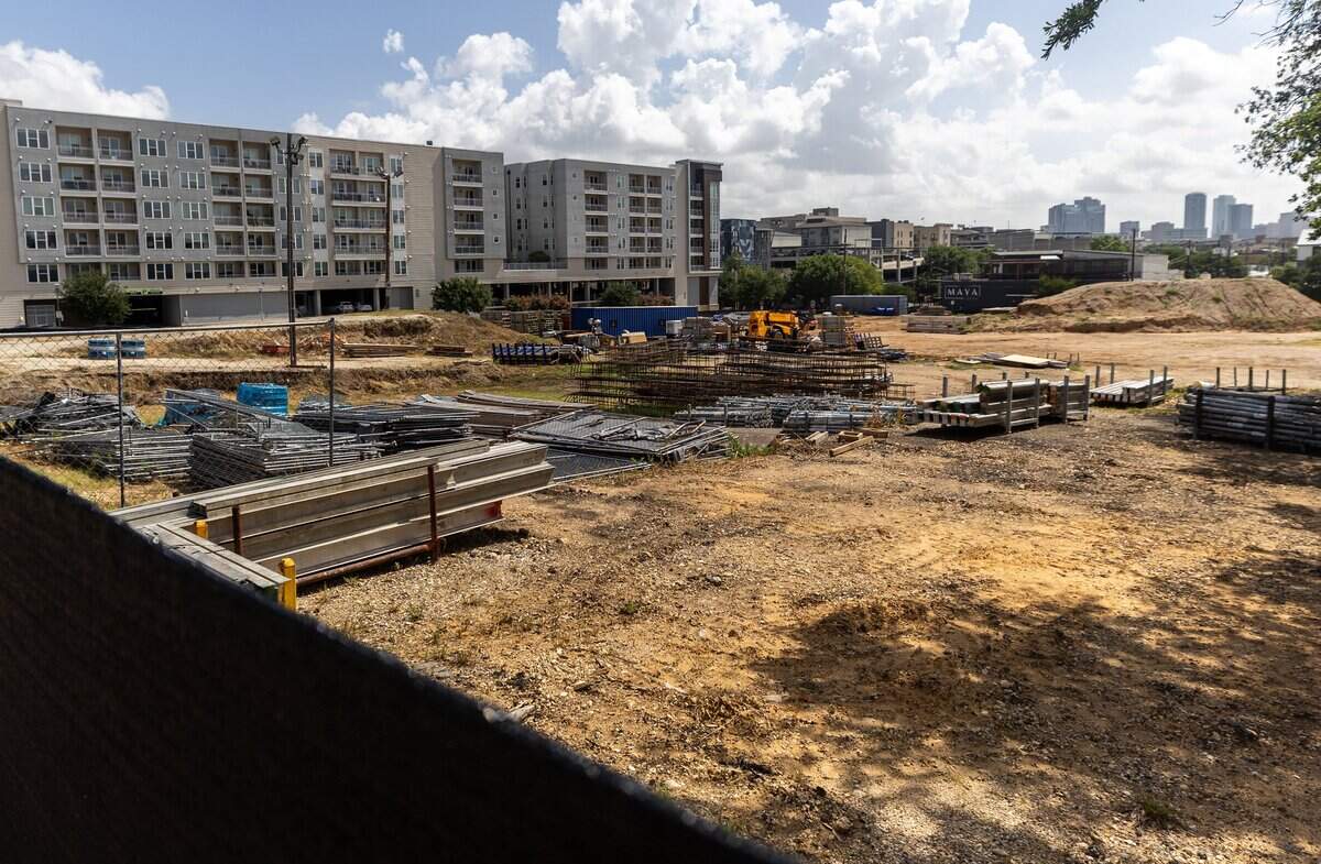An area under construction sits behind a fence on Morton Street in Fort Worth on July 15, 2026.
