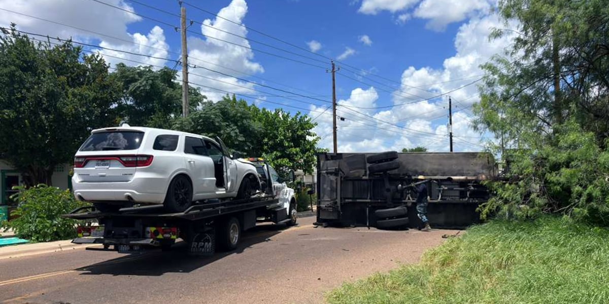 Box trailer overturns on Corpus Christi St., closes both lanes