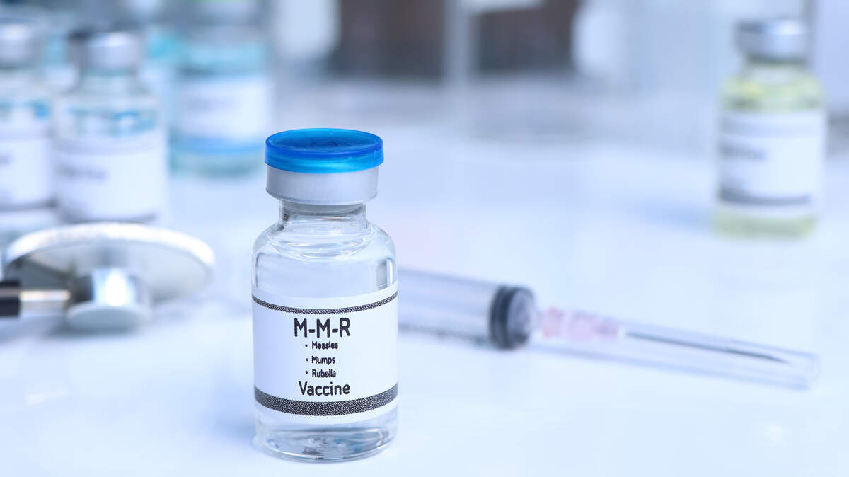 Photo illustration of the Measles, Mumps, Rubella vaccine in a vial. Photo illustration of the Measles, Mumps, Rubella vaccine in a vial.