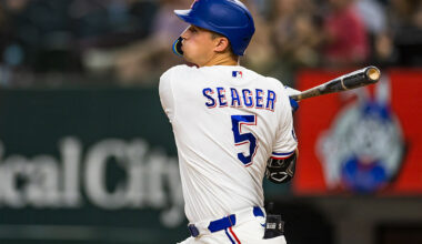 ARLINGTON, TEXAS - JUNE 06: Corey Seager #5 of the Texas Rangers follows through after hitting a single during the first inning of a game against the Cleveland Guardians at Globe Life Field on June 06, 2026 in Arlington, Texas. (Photo by John E. Moore III/Getty Images)