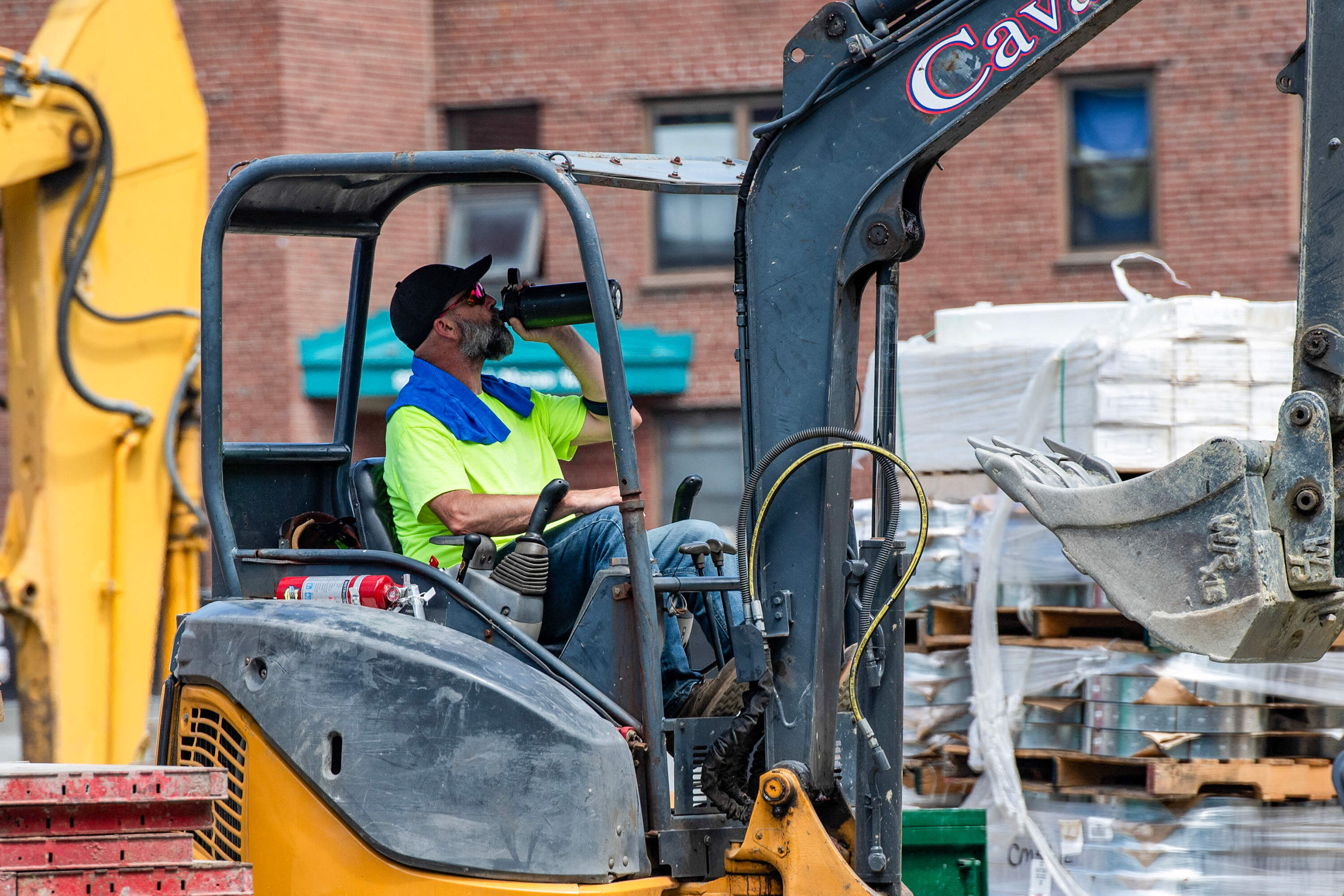 A construction worker takes a water break during a heat wave in Boston, Massachusetts on July 1, 2026. (Joseph Prezioso/AFP via Getty Images)