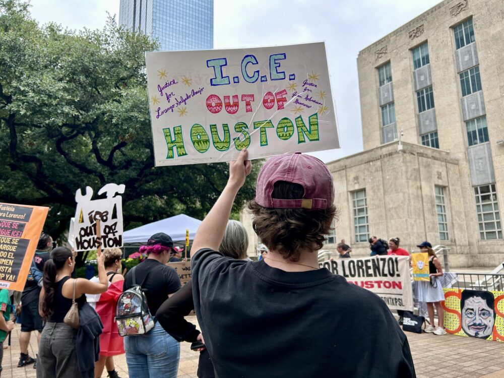 Dozens gathered outside of city hall Tuesday July 14 to protest Immigration and Customs Enforcement operations and to call on local leaders to hold those responsible for Salgado Araujo's death accountable.