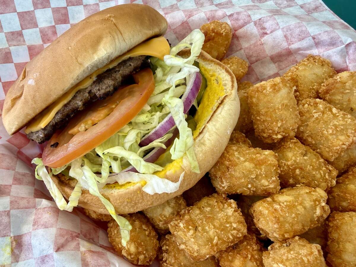 The cheeseburger with fresh vegetables, one of 10 burger varieties up to triple meat and cheese, served here with tater tots at the Burger Box in Richland Hills, Texas, as seen Feb. 6, 2026.