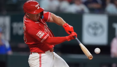 Langford and Burger homer in a four-run eighth as the Rangers beat the Astros 7-3