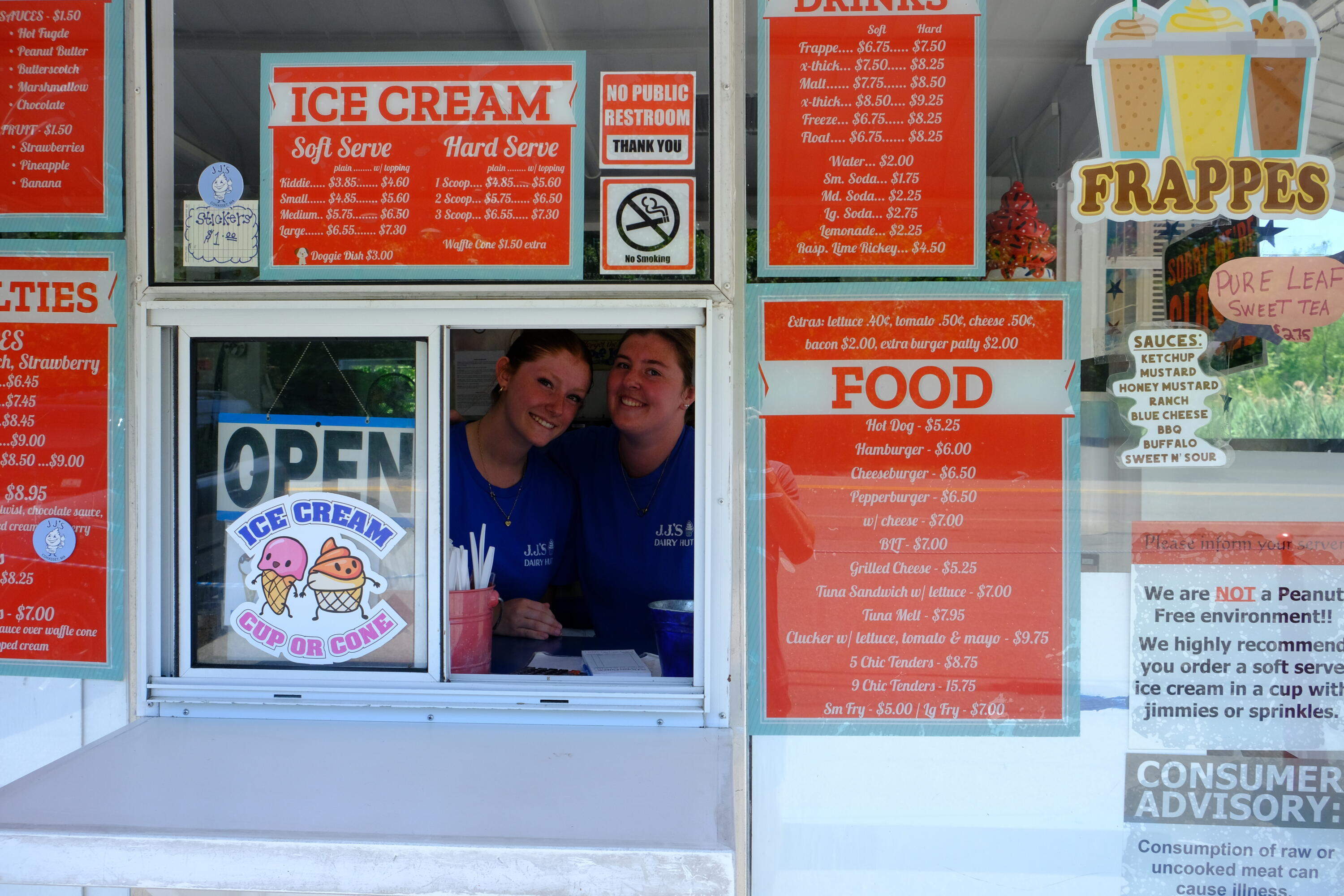 Two employees of J.J's Dairy Hut in Cohasset. (Patrick Madden/WBUR)