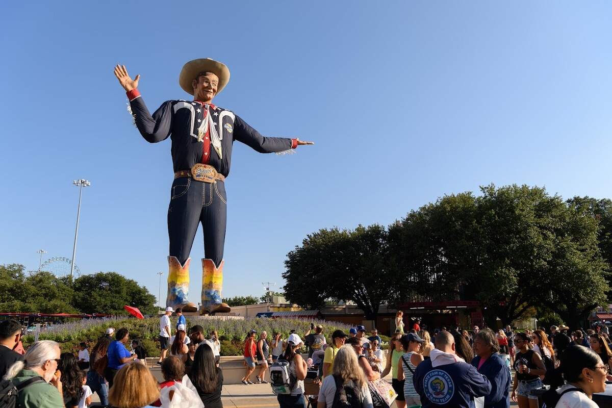 Big Tex sporting size 96 Lucchese boots at the State Fair of Texas. The design in this photo is from 2023 to 2025 fair seasons. In 2026, he will have a new pair designed by Aaliyah McNeal from Dallas.