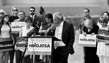 Mike Hinojosa at a press conference