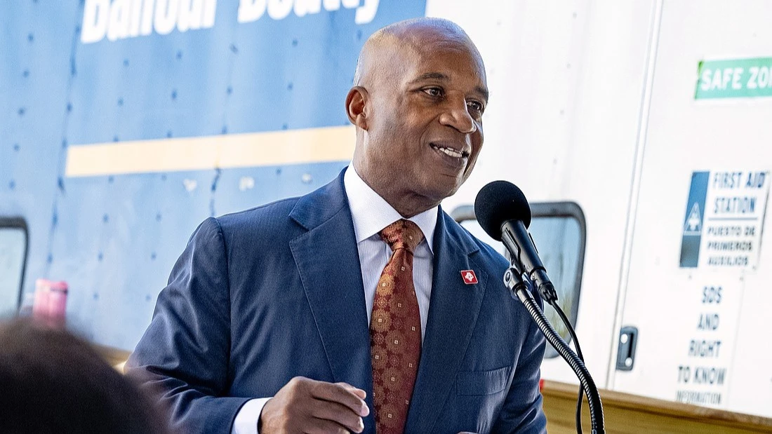 Nat Ford, CEO of JTA, speaking at a microphone.
