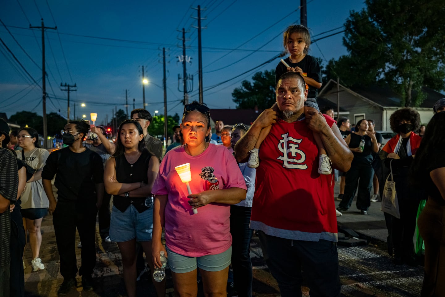 Community members gather at a rally and candlelight vigil for Lorenzo Salgado Araujo, an undocumented immigrant from Mexico who was killed after an encounter with federal agents in Houston, on July 8.
