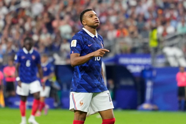 France's Kylian Mbappe (10) reacts during the World Cup semifinal soccer match between France and Spain in Arlington, Texas, near Dallas, Tuesday, July 14, 2026. (AP Photo/Tony Gutierrez)
