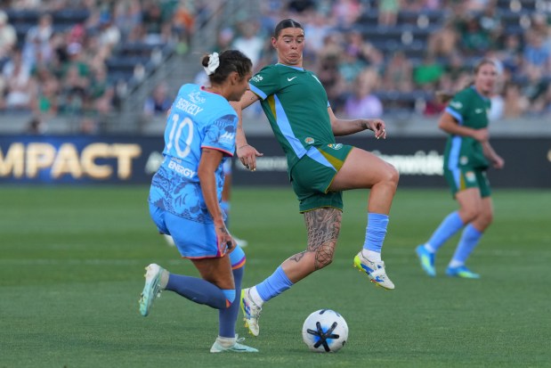 Denver Summit FC forward Natasha Flint (26) attempts to take possession of the ball in a battle against Houston Dash defender Malia Berkely (10) at Dick's Sporting Goods Park in Commerce City on Sunday, July 12, 2026. (Photo by Harmon Dobson/The Denver Post)