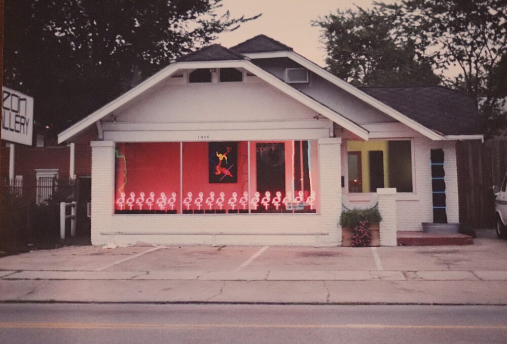 The Neon Gallery photographed in the early 90s. Before clients picked up commissioned works, Tim Walker would hang the pieces in the windows for the neighborhood to enjoy. 