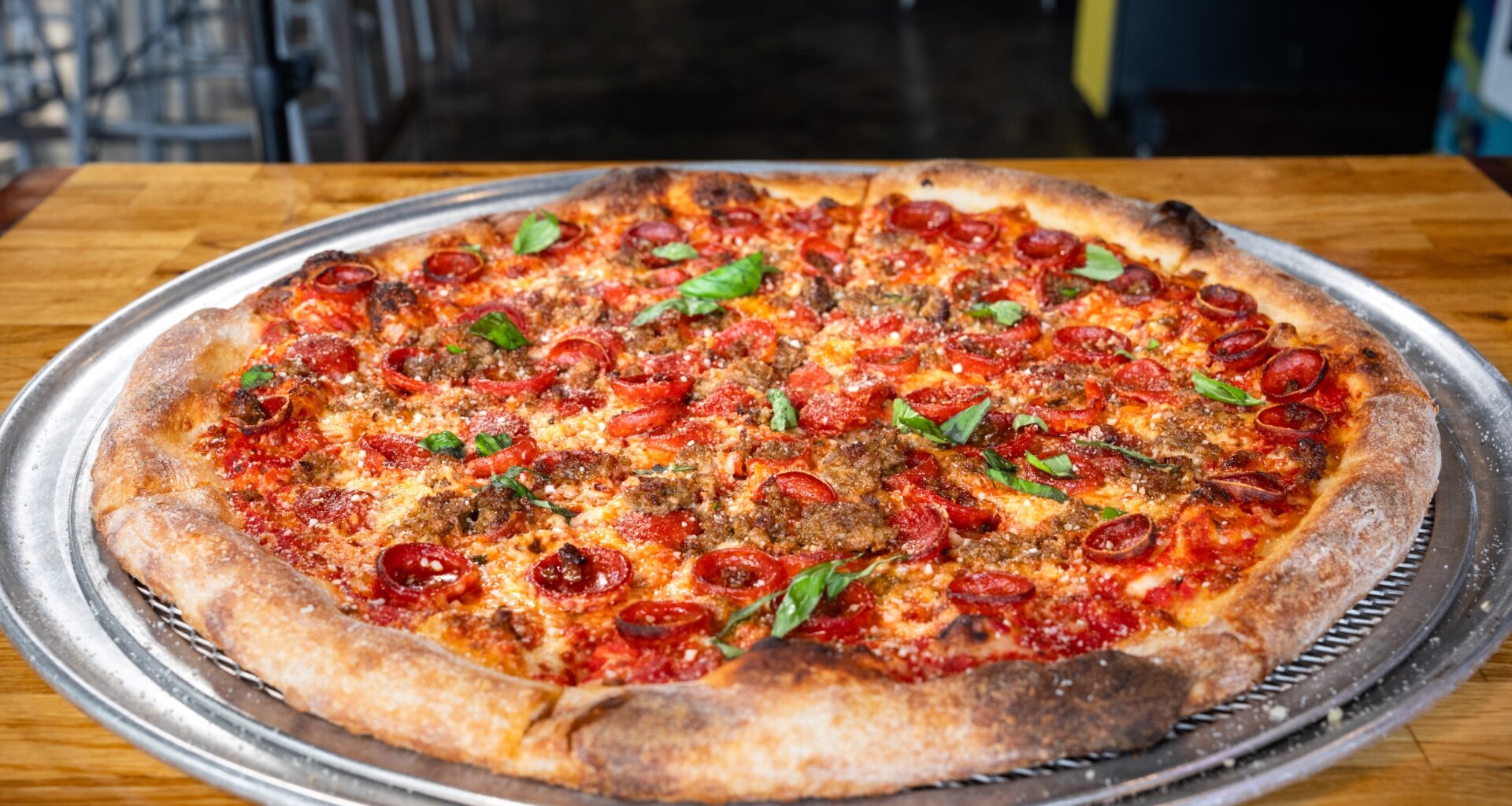 a round new york style pizza from Thunderbird pies.