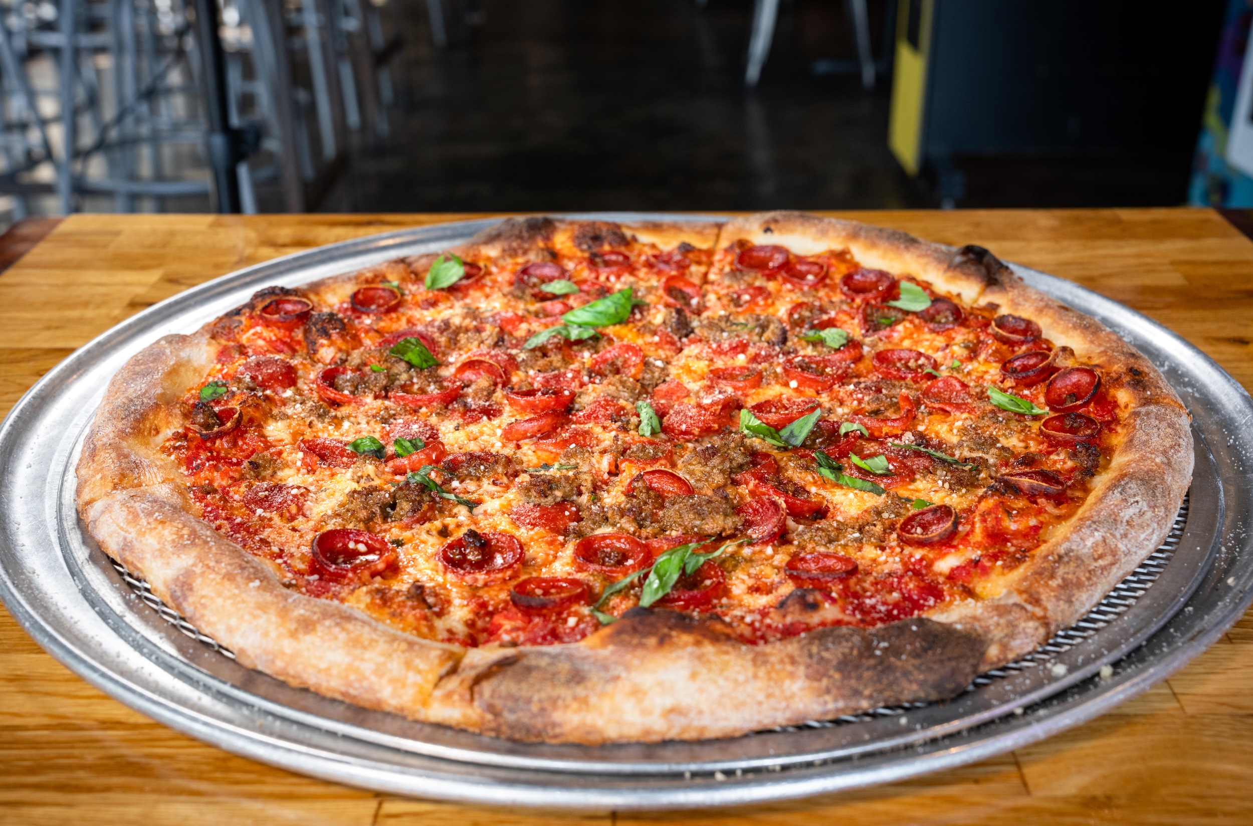 a round new york style pizza from Thunderbird pies.