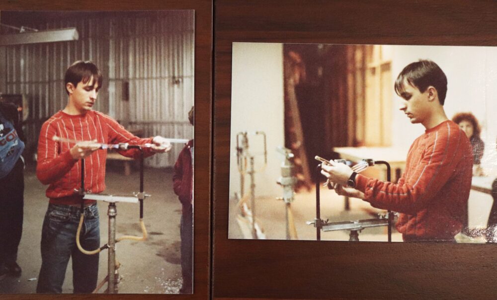 A young Tim Walker at work crafting a neon piece. His family estimates he may have been about 24 years old here 