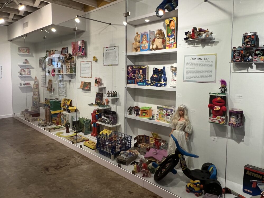 A display at the Houston Toy Museum showcases toys from different decades.