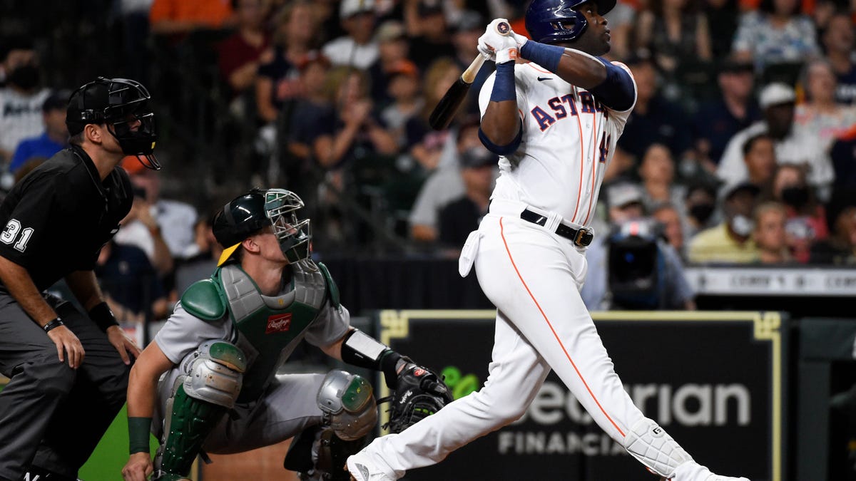 Houston Astros' Yordan Alvarez, right, hits a three-run home run during the fifth inning of a baseball game against the Oakland Athletics, Tuesday, July 6, 2021, in Houston. (AP Photo/Eric Christian Smith)