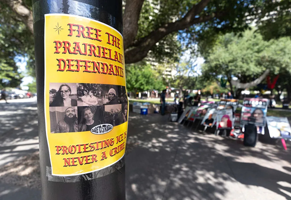 Friends of the defendants convicted in the Prairieland ICE Detention Center terrorism case brought signs to show their support as seven of the defendants were sentenced Wednesday, July 1, 2026, in Fort Worth, Texas.
