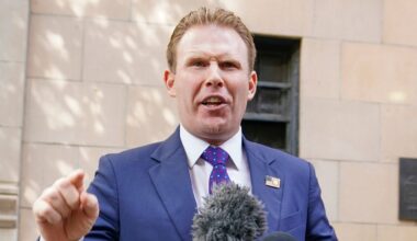 Andrew Giuliani, son of former New York Mayor Rudy Giuliani, speaks to reporters outside the building where his father lives, Wednesday, April 28, 2021, in New York. (AP Photo/Mary Altaffer)