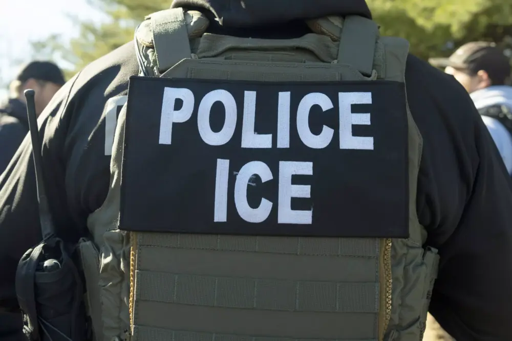 FILE - A U.S. Immigration and Customs Enforcement officer listens during a briefing, Jan. 27, 2025, in Silver Spring, Md.