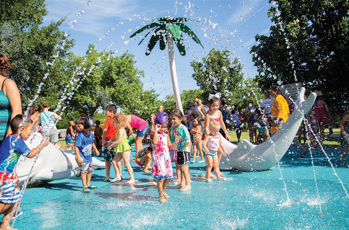Kids playing in a splash pad