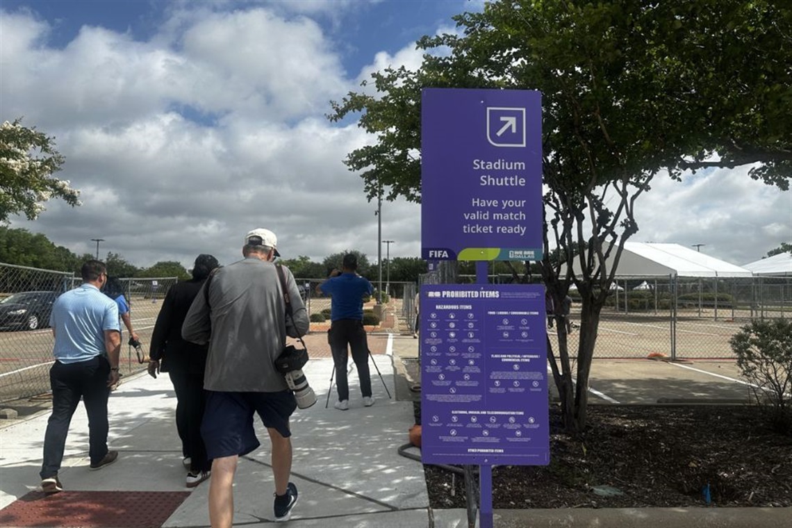 a sign of the Stadium shuttle at CenterPort
