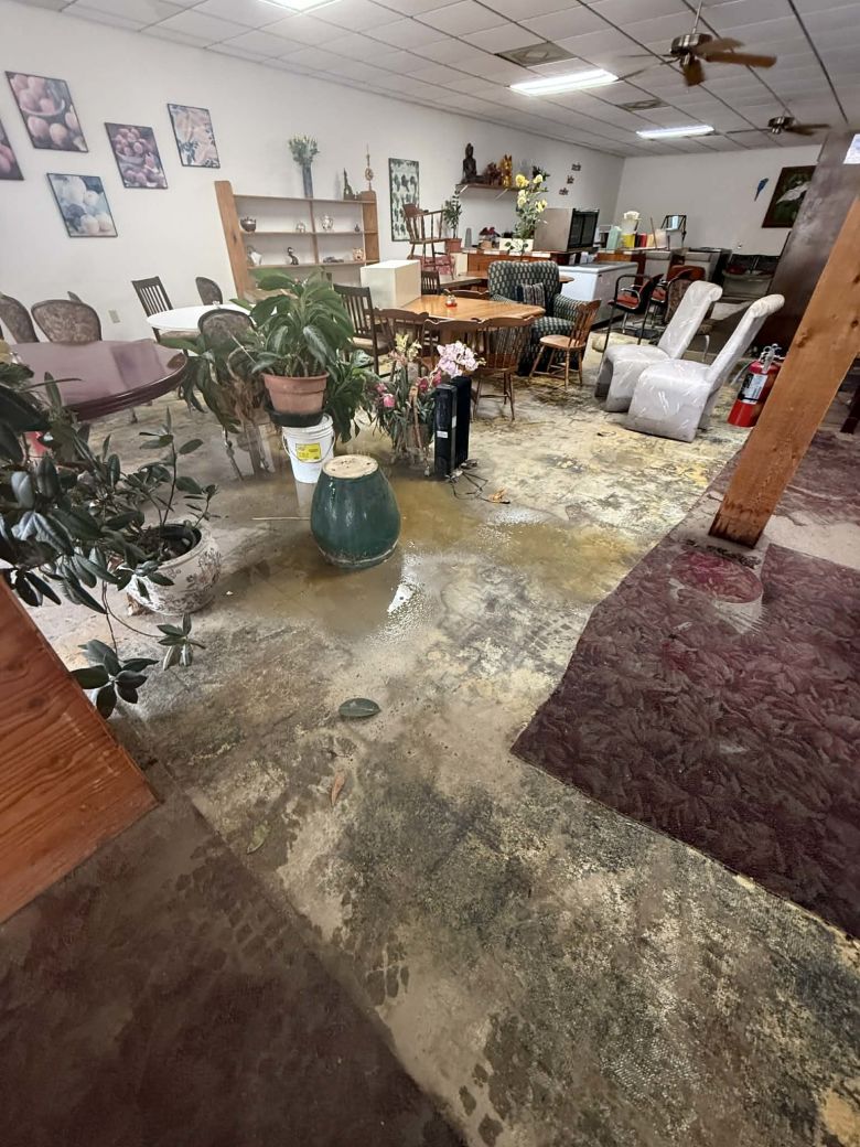 Chong Chin's home, which sits on the same property as the deli, was ruined by the floods. He and his wife slept on muddy mattresses for days.