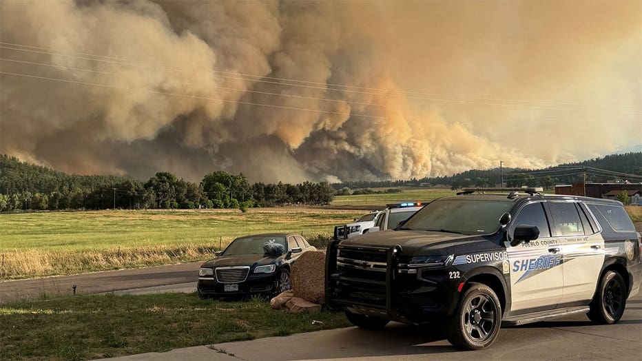 Smoke rises from the Aspen Acres Wildfire in Colorado in June 2026.