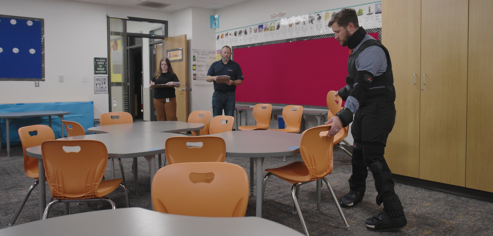 A simulation participant completes a classroom task