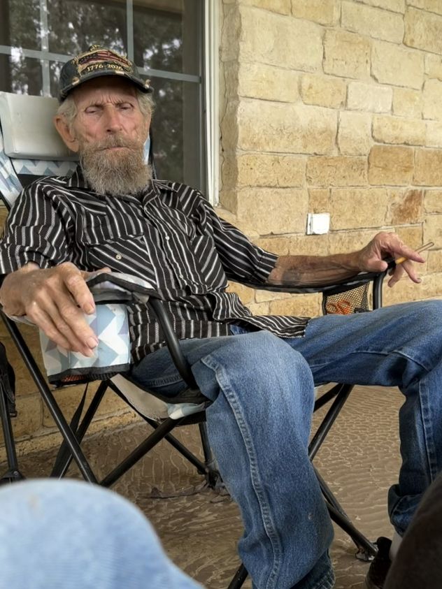 L.A. Cude sits back as he shares his story with Cord Shiflet, a volunteer who is fundraising to help him restart his life again.
