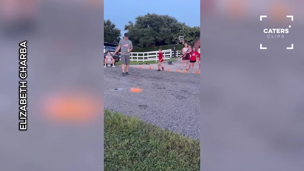 Stray Firework Sends Woman Sprinting for Cover in Texas