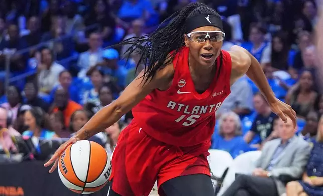 Atlanta Dream guard Allisha Gray (15) drives during the second half of a WNBA basketball game against the Dallas Wings in Arlington, Texas, Wednesday, July 29, 2026. (AP Photo/LM Otero)